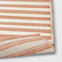 7'x10' Narrow Wornstripe Rectangular Woven Outdoor Area Rug Coral Orange - Threshold™ -Outdoor Furniture Store GUEST 25e56bbe db53 43e9 807e 1d35d9996e1a