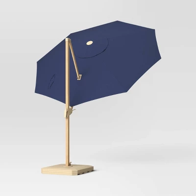11'x11' Offset Solar Outdoor Market Umbrella Navy - Light Wood Pole - Threshold™ 11'x11' Offset Solar Outdoor Market Umbrella Navy - Light Wood Pole - Threshold™ -Outdoor Furniture Store GUEST 62667af1 2dcf 4cdc 8cab ed800ef5bee9