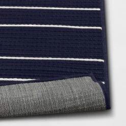 7'x10' Thin Stripe Rectangular Woven Outdoor Area Rug Navy/Ivory - Threshold™ -Outdoor Furniture Store GUEST d8dd5e92 4349 401f 907f d39c6645ef8e